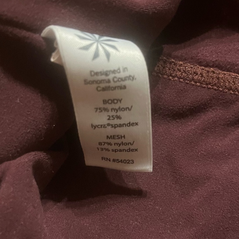 Athleta High-Rise Powervita Peekaboo 7/8 Tight in Maroon - Picture 13 of 14